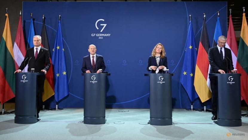 Scholz warns Russia of consequences if it invades Ukraine Scholz warns Russia of consequences if it invades Ukraine