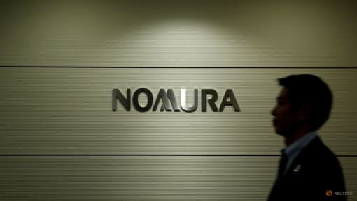 China bans Nomura senior investment banker from leaving mainland: Sources