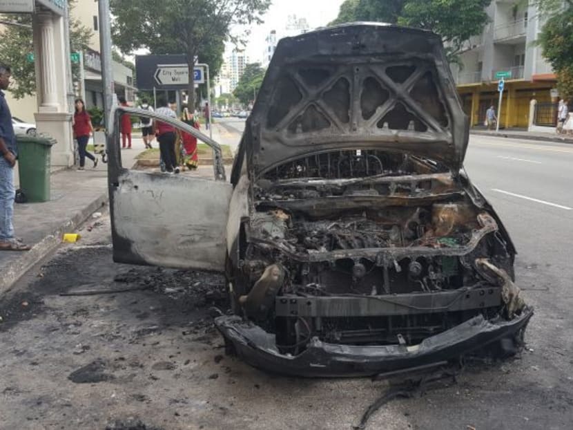 Car in flames at Serangoon Road Car in flames at Serangoon Road