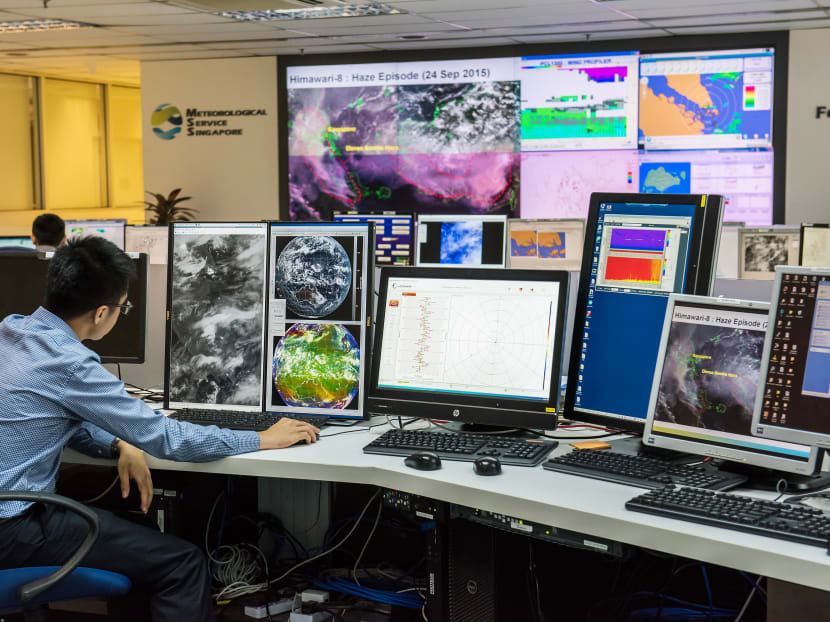 Meteorologist Wong Song Han, 27, uses the Himawari-8 satellite and LIDAR system for monitoring weather and the haze. Photo: Nuria Ling/TODAY