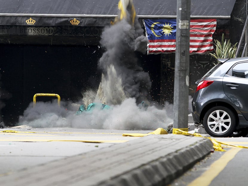 Gallery: Bukit Bintang grenade attack ‘motivated by gang dispute’