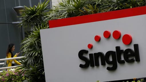 Singtel falls up to 3% after $2.3 billion impairment
