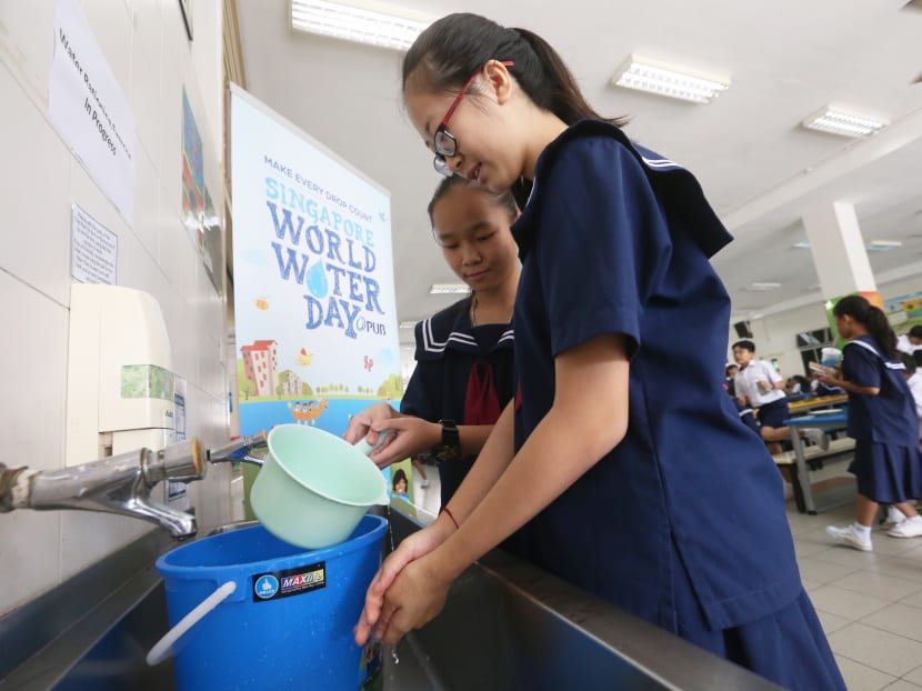 Students of Woodgrove Secondary School participating in a water rationing exercise on March 1, 2017. Photo: Ooi Boon Keong/TODAY