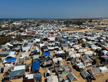 Displaced Palestinians, who fled their houses due to Israeli strikes, shelter in a tent camp, amid the ongoing conflict between Israel and the Palestinian Islamist group Hamas, in Rafah, in the southern Gaza Strip on March 11, 2024.