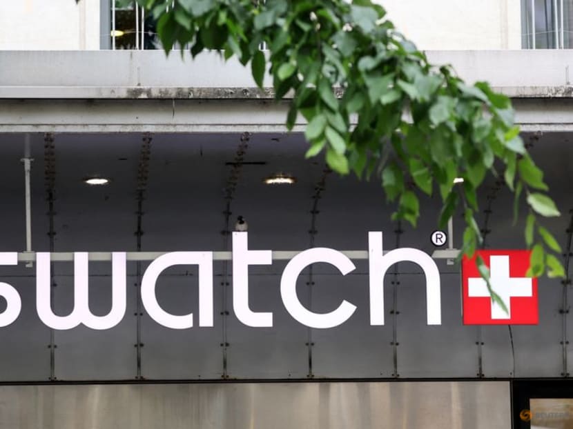 A logo of Swiss watch maker Swatch on a store in Geneva, Switzerland. A logo of Swiss watch maker Swatch on a store in Geneva, Switzerland.