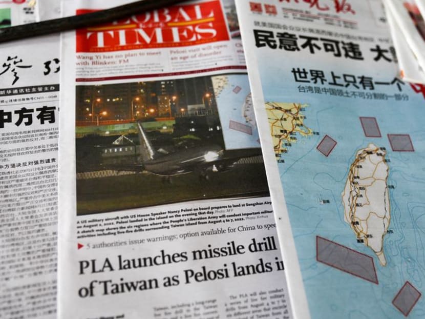 FILE PHOTO: A map showing locations where Chinese People's Liberation Army (PLA) will conduct military exercises and training activities including live-fire drills is seen on newspaper reports of US House of Representatives Speaker Nancy Pelosi's visit to Taiwan, at a newsstand in Beijing, China August 3, 2022. REUTERS/Tingshu Wang