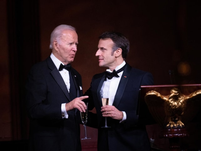 United States President Joe Biden and French President Emmanuel Macron during a state dinner on the South Lawn of the White House in Washington, DC, on Dec 1, 2022.
