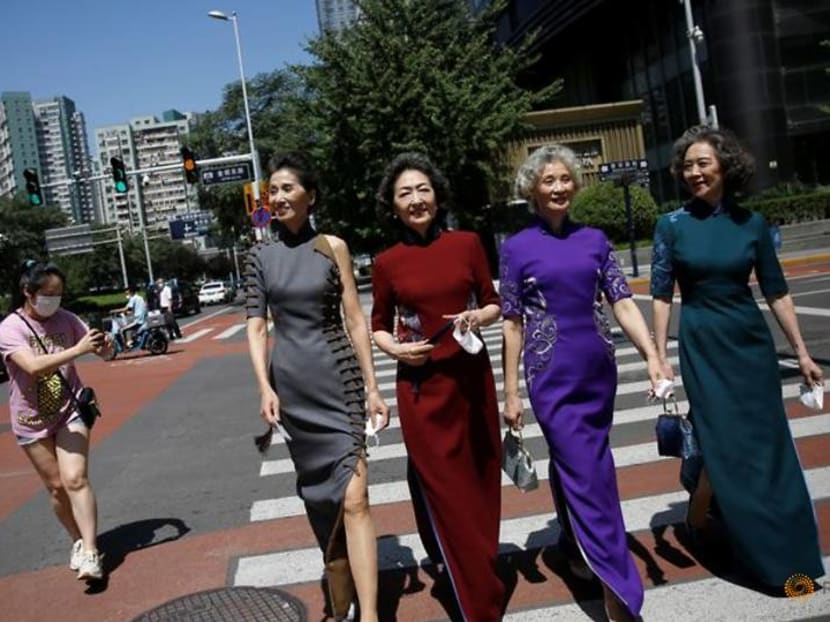 Remove masks, celebrate freedom: fashion grannies return to Beijing street 'catwalk'