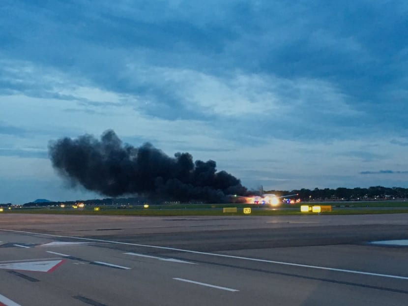 SIA jet makes emergency return to Changi, bursts into flames on runway