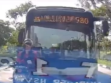 A screengrab of a video on Facebook group Sg Road Vigilante showed bus service 980 approaching the McDonald's delivery rider from the back before rear-ending him.