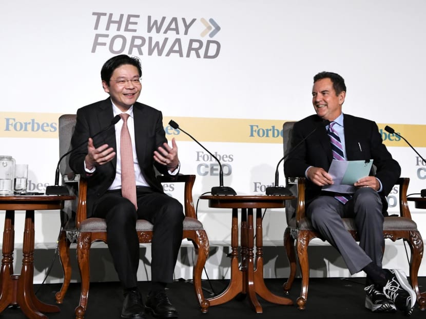 Deputy Prime Minister Lawrence Wong is seen here with editor-at-large of Forbes Media, Mr Rich Karlgaard, at the Forbes Global CEO Conference 2022 on Sept 26, 2022. 