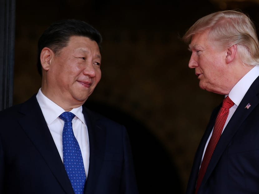 Presidents Donald Trump and Xi Jinping at their first summit in Palm Beach, Florida, in April 2017.The US and China are not natural partners, nor are they inevitable enemies, says Mr Kausikan.