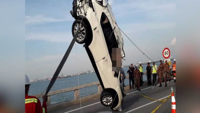 Penang Bridge accident: Rescuers retrieve car that fell into sea - CNA