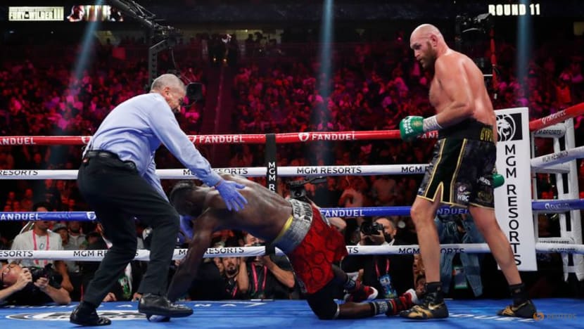 Fury defeats Wilder with 11th round knockout to retain WBC title Fury defeats Wilder with 11th round knockout to retain WBC title