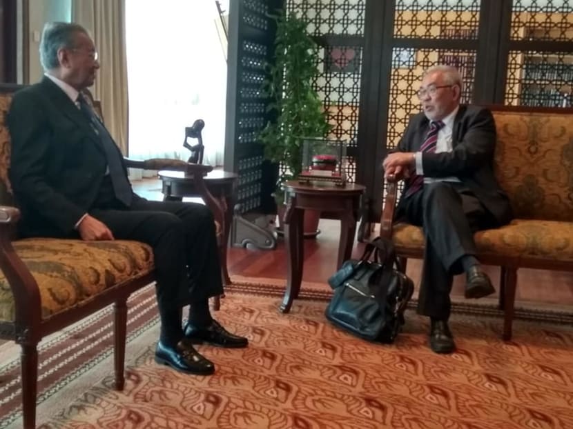 Political dissident Tan Wah Piow in an 80-minute meeting with Dr Mahathir Mohamad in Kuala Lumpur.