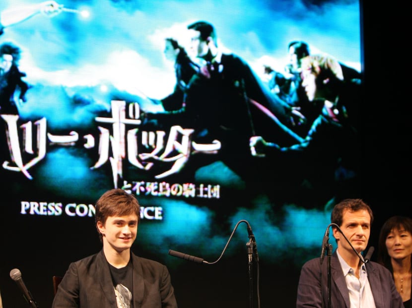 British actor Daniel Radcliffe (second left) and producer David Heyman (second right) at a press conference in Tokyo on June 29, 2007 for their film Harry Potter and the Order of the Phoenix. Photo: AFP