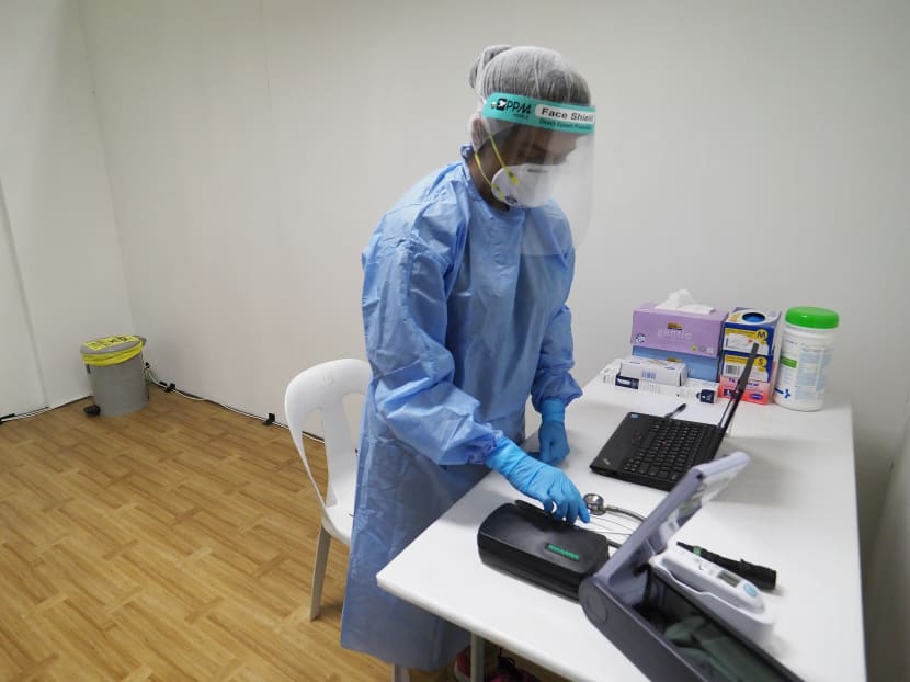 A medical worker at a community care facility in Changi Exhibition Centre. The authorities are reminding workers at such facilities about infection control and refreshing their knowledge in this area. A medical worker at a community care facility in Changi Exhibition Centre. The authorities are reminding workers at such facilities about infection control and refreshing their knowledge in this area.