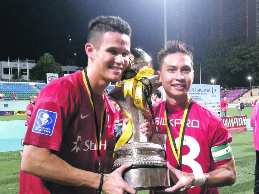 Baihakki Khaizan and Shahril Ishak were key members of the LionsXII team that won the Malaysia Super League in 2013. They are hoping to win titles with their new S.League club Warriors FC this year. TODAY File Photo