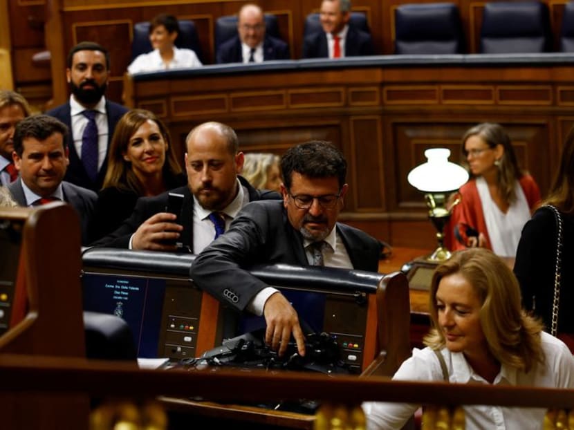Spain lawmakers don earphones as regional languages make debut in lower house Spain lawmakers don earphones as regional languages make debut in lower house