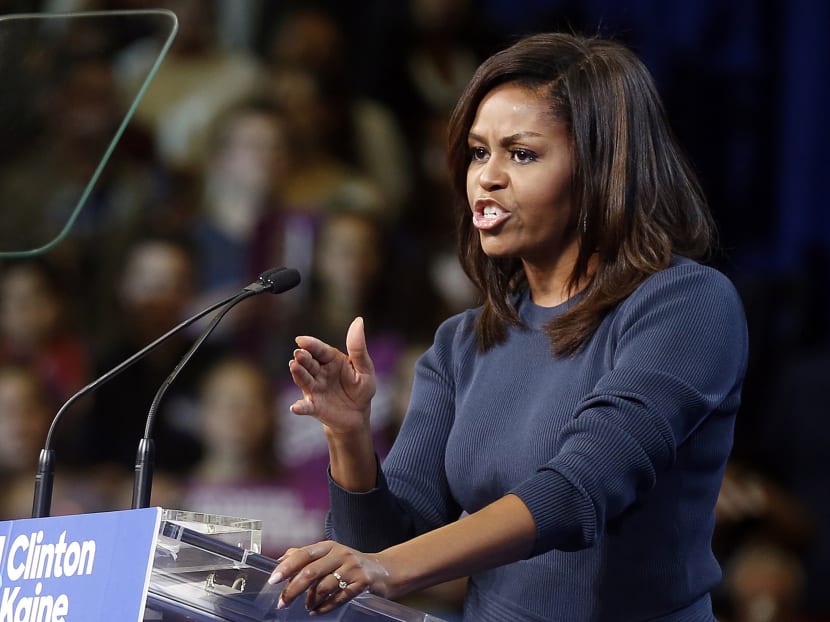 First lady Michelle Obama speaks during a campaign rally for Democratic presidential candidate Hillary Clinton on Thursday, in Manchester, New Hampshire. Photo: AP