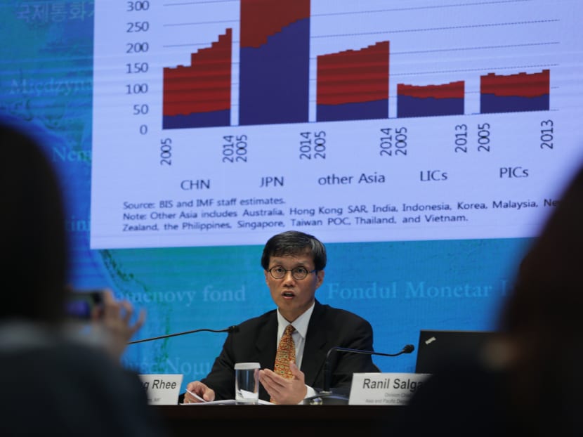 Mr Changyong Rhee, director of the Asia and Pacific Department for the International Monetary Fund (IMF), speaks at a press conference in Hong Kong on the IMF's regional economic outlook for Asia and Pacific on May 3. Photo: AFP