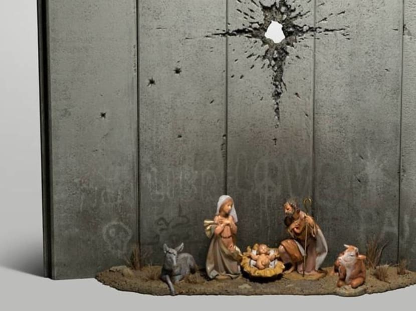 Mysterious artist Banksy’s latest work is a dark nativity scene in Bethlehem Mysterious artist Banksy’s latest work is a dark nativity scene in Bethlehem