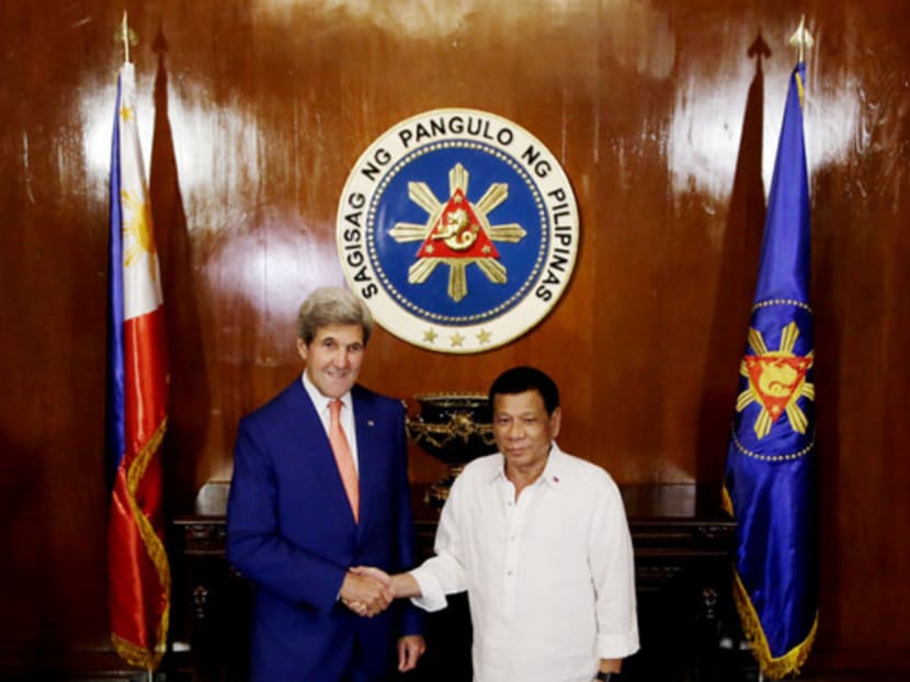 At the Malacanang Palace yesterday, US Secretary of State John Kerry discussed regional issues with Philippine President Rodrigo Duterte. They also talked about motorcycles and hunting. Photo: AP