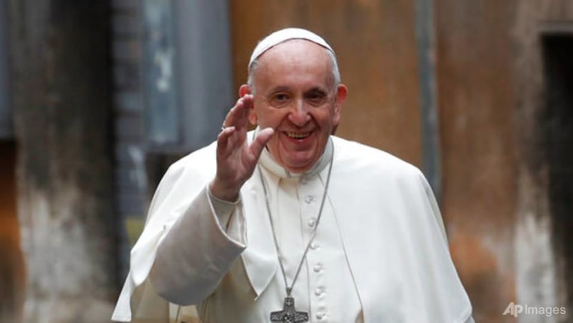 Pope celebrates mass of 'mercy' with prisoners, refugees Pope celebrates mass of 'mercy' with prisoners, refugees
