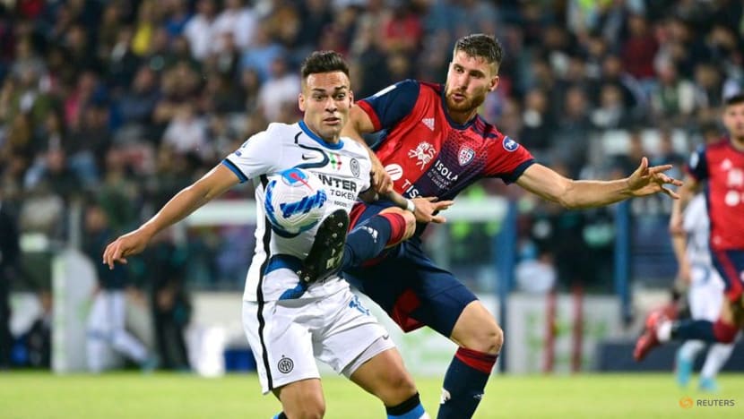 Inter take Serie A title race to final day with victory at Cagliari Inter take Serie A title race to final day with victory at Cagliari