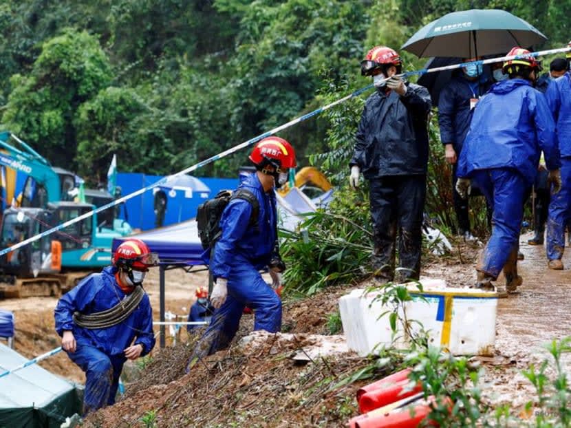 Rescue workers work at the site where a China Eastern Airlines Boeing 737-800 plane flying from Kunming to Guangzhou crashed, in Wuzhou, Guangxi Zhuang Autonomous Region, China March 24, 2022.