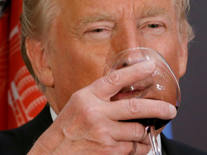 US President Donald Trump takes part in a toast during a luncheon hosted by the Secretary General of the United Nations in New York, US, Sept 19, 2017. Photo: Reuters