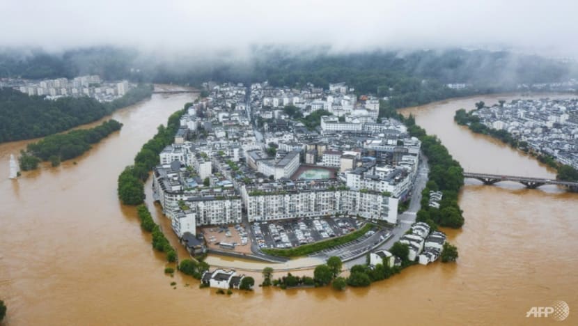Hundreds of thousands evacuated in China after heaviest rains in decades