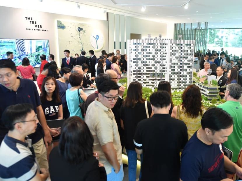 File photo of visitors at the showroom of developer UOL Group's project The Tre Ver in Potong Pasir/