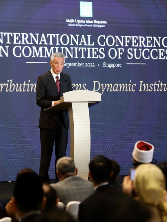 Prime Minister Lee Hsien Loong delivering his keynote address at the inaugural International Conference on Communities of Success on Sept 9, 2022. 