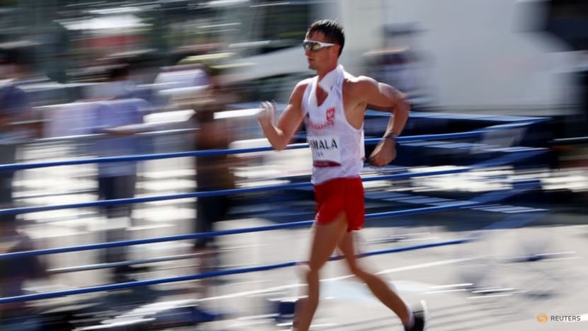 Olympics-Athletics-Poland's Tomala wins gold after switch to 50km walk Olympics-Athletics-Poland's Tomala wins gold after switch to 50km walk
