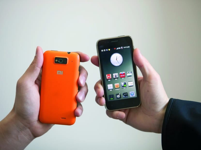 Xiaomi’s phones use the Android operating system and are considerably cheaper. Photo: Bloomberg