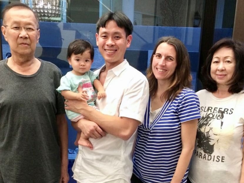 Mr Louis Ng holding daughter Ella at a birthday celebration with his parents and wife in this 2014 photo. It turned out to be the last birthday celebration he had with his father.