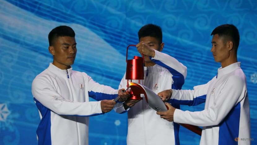 Beijing lights flame, to be first city to host summer, winter games Beijing lights flame, to be first city to host summer, winter games