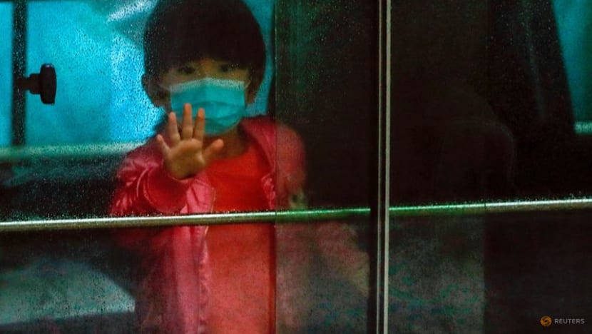 Hong Kong families despair as COVID-19 rules may separate them from children Hong Kong families despair as COVID-19 rules may separate them from children