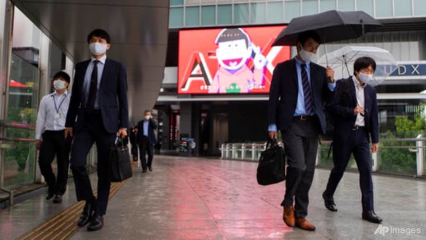 Japan raises view on consumption, but says economy in severe situation Japan raises view on consumption, but says economy in severe situation