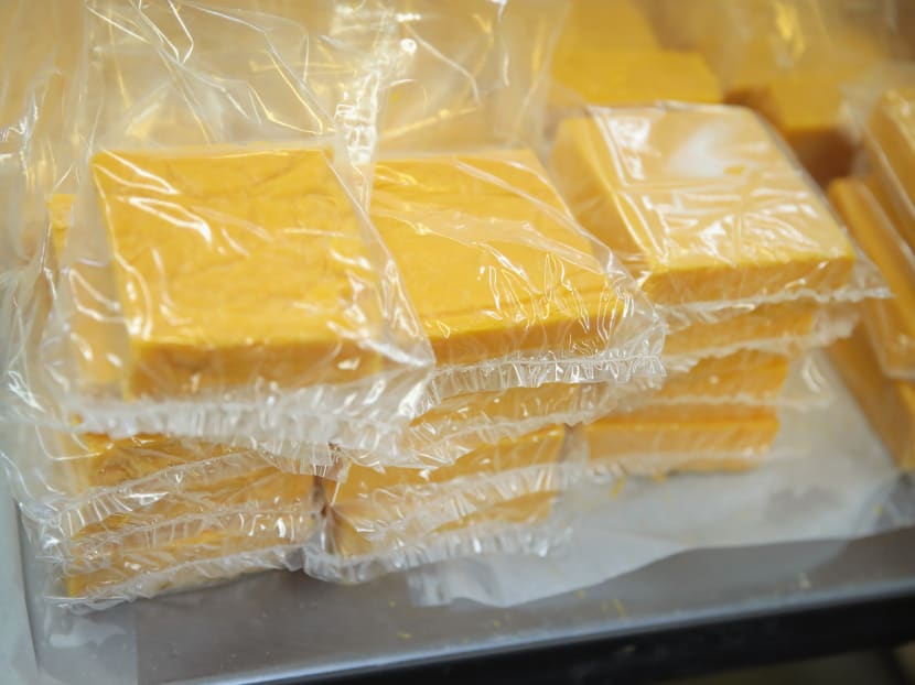 Cheese packaged for sale. Edible, biodegradable packaging made of casein would be up to 500 times better than plastic at keeping oxygen away from food. Photo: AFP