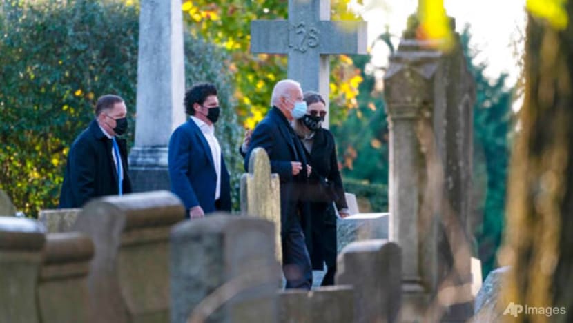 Biden begins US election day visiting son's grave