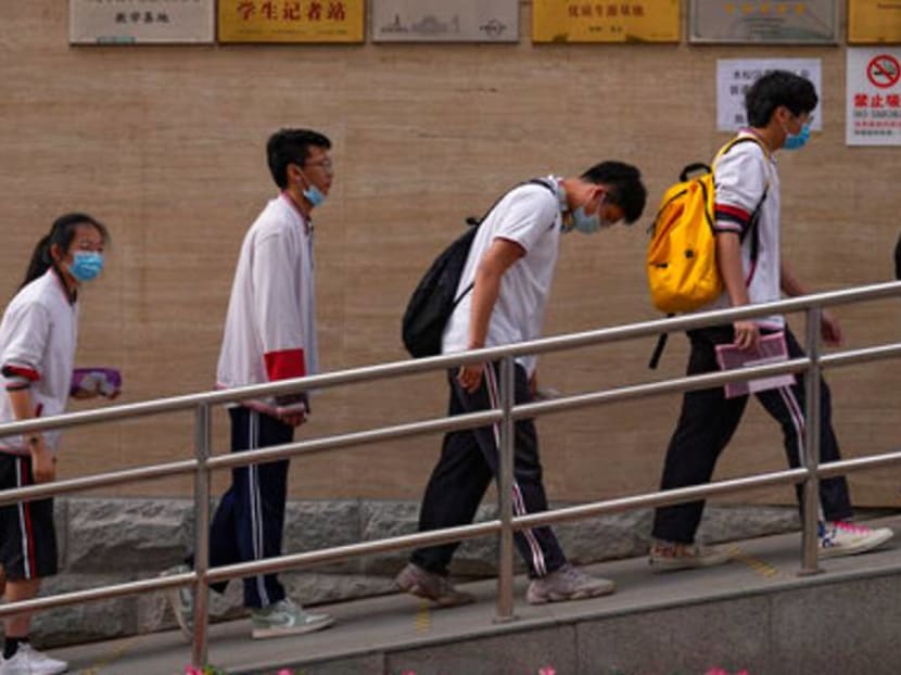 Commentary: Chinese youth want to 'lie flat'. Authorities are taking them seriously Commentary: Chinese youth want to 'lie flat'. Authorities are taking them seriously