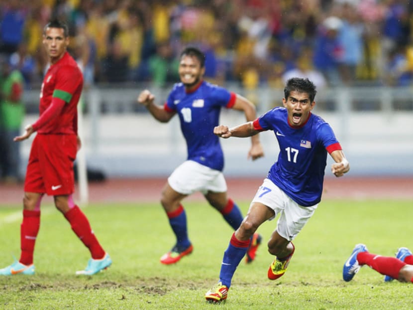 Malaysia play Myanmar this Sunday at the Jalan Besar Stadium, but coach Dollah Salleh says its synthetic pitch still bothers 
his players. 
Photo: Reuters