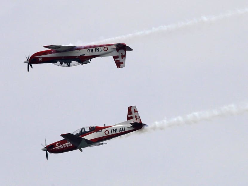 Indonesia Air Force's Jupiter Aerobatic team performs a manoeuvre during an aerial display ahead of the Singapore Airshow. Photo: REUTERS