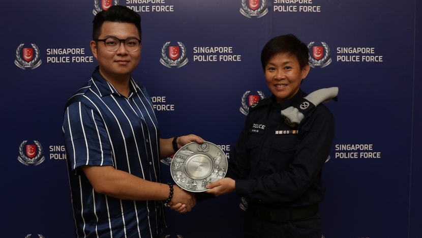 Man honoured for helping police nab upskirt video suspect at Marsiling MRT station