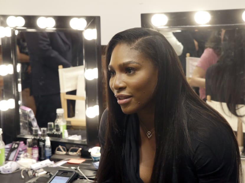 Serena Williams speaks to reporters backstage after she presented her Spring 2016 collection during Fashion Week in New York, Tuesday, Sept 15, 2015. Photo: AP
