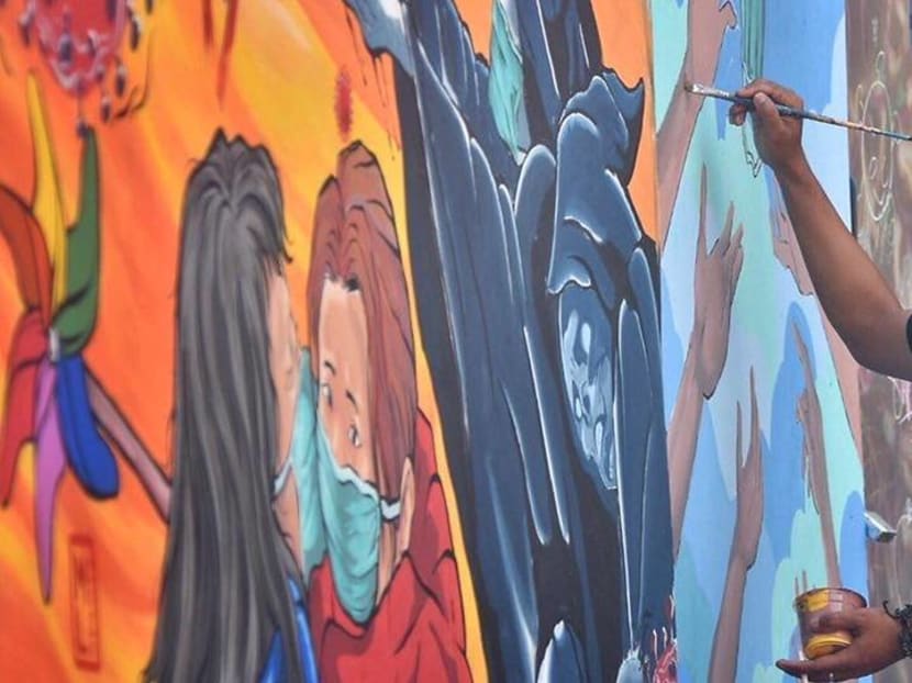 Livelihoods hit by COVID-19, Indonesian mural artists channel efforts towards positive messages Livelihoods hit by COVID-19, Indonesian mural artists channel efforts towards positive messages