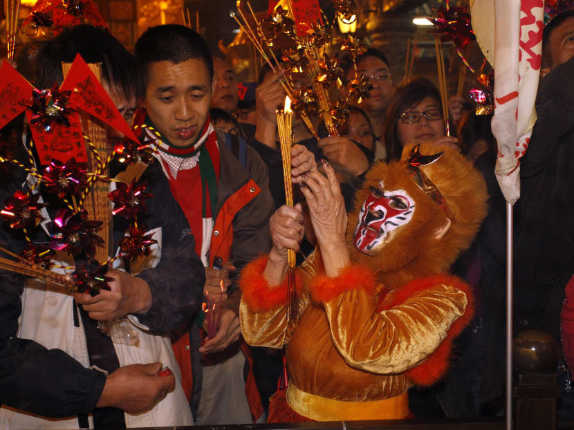 Gallery: Lunar New Year turbulence as ‘fire monkey’ swings into action