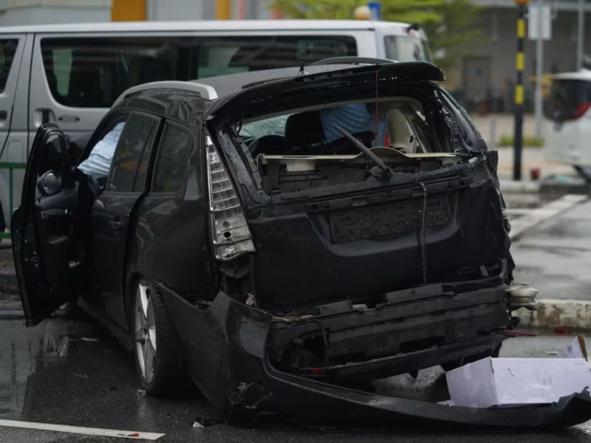 A damaged car is seen at the junction of Tampines Avenue 1 and Tampines Avenue 4 on April 22, 2024, after an accident.